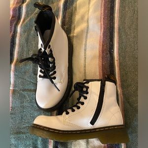 Girl’s Doc Martens.